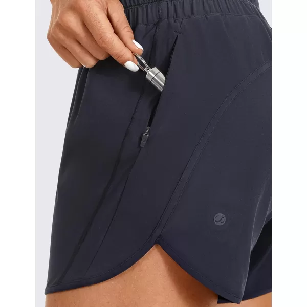 CRZ YOGA Womens Mid Waisted Running Shorts Liner  5 Quick Dry Athletic Sport Workout Track Shorts Zip PocketNavy