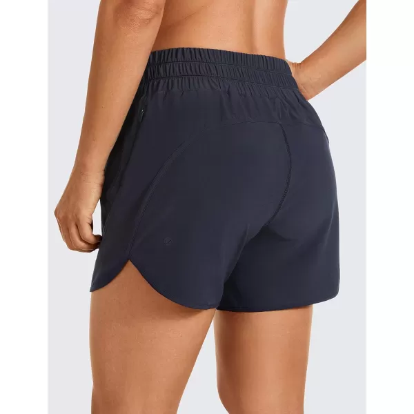 CRZ YOGA Womens Mid Waisted Running Shorts Liner  5 Quick Dry Athletic Sport Workout Track Shorts Zip PocketNavy