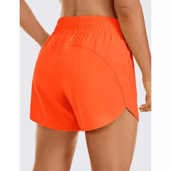 CRZ YOGA Womens Mid Waisted Running Shorts Liner  5 Quick Dry Athletic Sport Workout Track Shorts Zip PocketNeon Orange