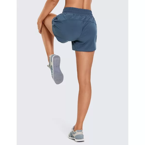 CRZ YOGA Womens Mid Waisted Running Shorts Liner  5 Quick Dry Athletic Sport Workout Track Shorts Zip PocketStelindigo Blue