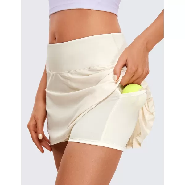 CRZ YOGA Womens Pleated Tennis Skirts with Pockets High Waisted Athletic Golf Skorts Skirts for Women Soft Breathable CuteWhite Apricot