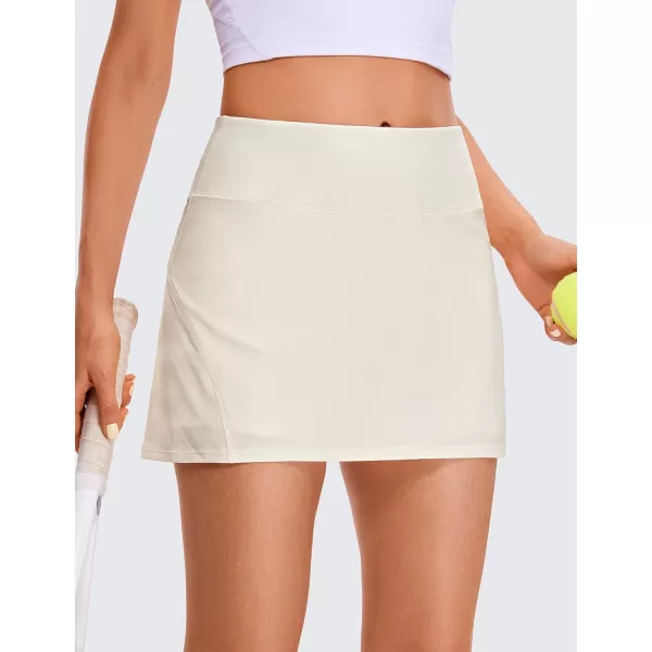 CRZ YOGA Womens Pleated Tennis Skirts with Pockets High Waisted Athletic Golf Skorts Skirts for Women Soft Breathable CuteWhite Apricot