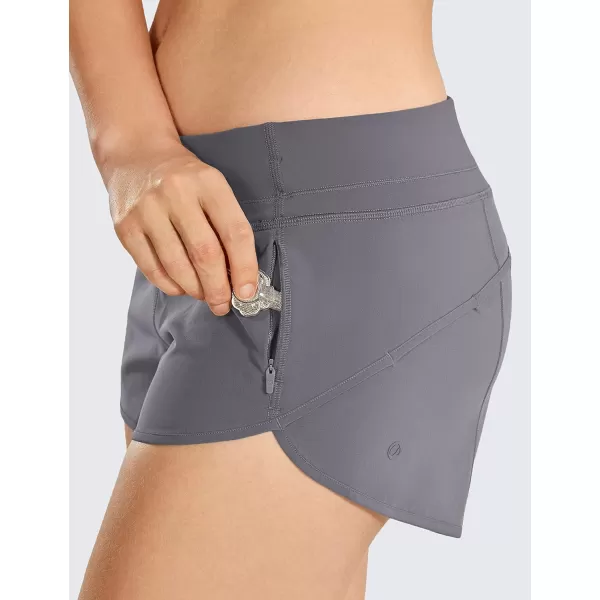 CRZ YOGA Womens Quick Dry Workout Running Shorts Mesh Liner  25 Drawstring Sport Gym Athletic Shorts Zip PocketDark Carbon