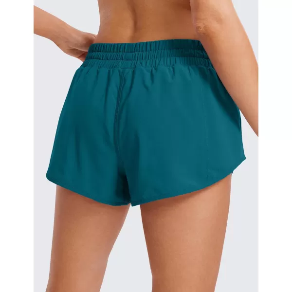 CRZ YOGA Womens Running Shorts Low Waisted 25  Mesh Liner Quick Dry Track Gym Athletic Workout Shorts with Zip PocketBorealis Green