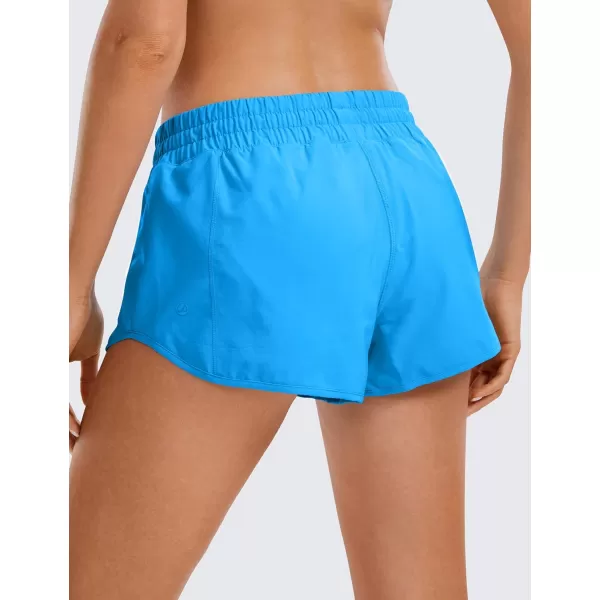 CRZ YOGA Womens Running Shorts Low Waisted 25  Mesh Liner Quick Dry Track Gym Athletic Workout Shorts with Zip PocketMadagascar Blue