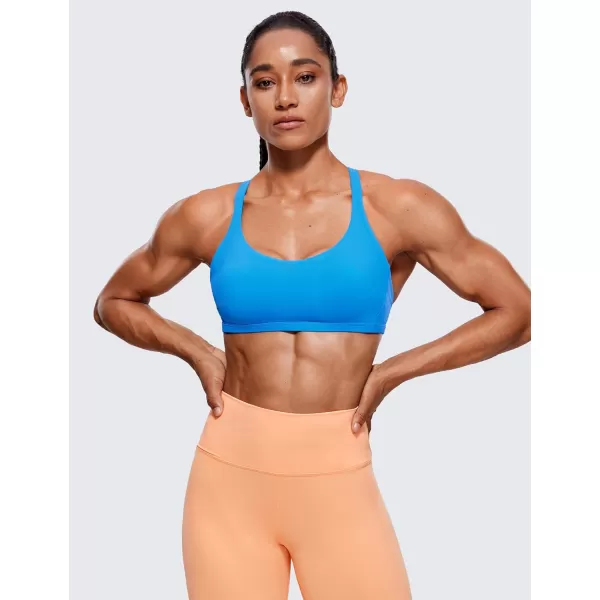 CRZ YOGA Womens Strappy Sports Bra  Criss Cross Back Padded Medium Support Wireless Gym Bra Sexy Workout Yoga BraMadagascar Blue