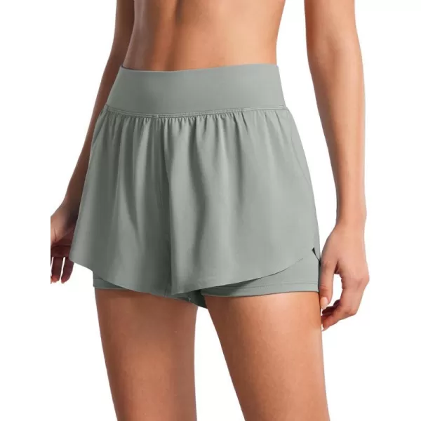 CRZ YOGA 2 in 1 Dolphin Running Shorts for Women High Waisted Gym Workot Athletic Tennis Shorts with Pockets SplitSterling