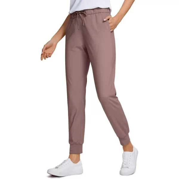 CRZ YOGA 4Way Stretch Golf Joggers for Women 27 Casual Travel Workout Pants Lounge Athletic Sweatpants with PocketsMauve