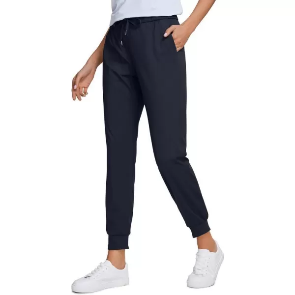 CRZ YOGA 4Way Stretch Golf Joggers for Women 27 Casual Travel Workout Pants Lounge Athletic Sweatpants with PocketsNavy