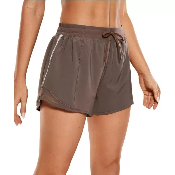 CRZ YOGA Athletic Shorts for Women with Zip Pocket 254 Mid Waist Mesh Liner Shorts for Running Gym WorkoutBrown Rock