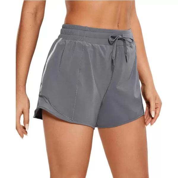 CRZ YOGA Athletic Shorts for Women with Zip Pocket 254 Mid Waist Mesh Liner Shorts for Running Gym WorkoutDark Carbon