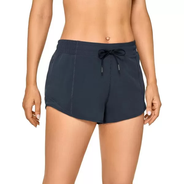 CRZ YOGA Athletic Shorts for Women with Zip Pocket 254 Mid Waist Mesh Liner Shorts for Running Gym WorkoutNewstelindigo