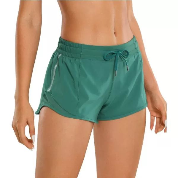 CRZ YOGA Athletic Shorts for Women with Zip Pocket 254 Mid Waist Mesh Liner Shorts for Running Gym WorkoutSmoky Green