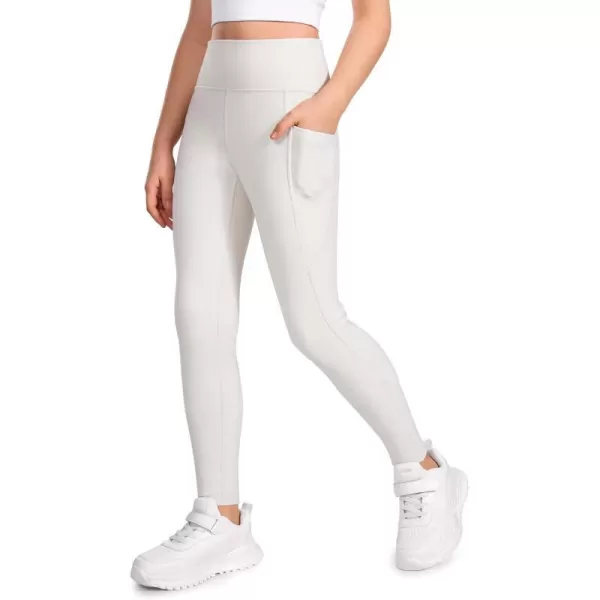 CRZ YOGA Girls Thermal Fleece Lined Athletic Leggings Water Resistant High Waist Warm Winter Kids Lounge Pants Side PocketsMilky White