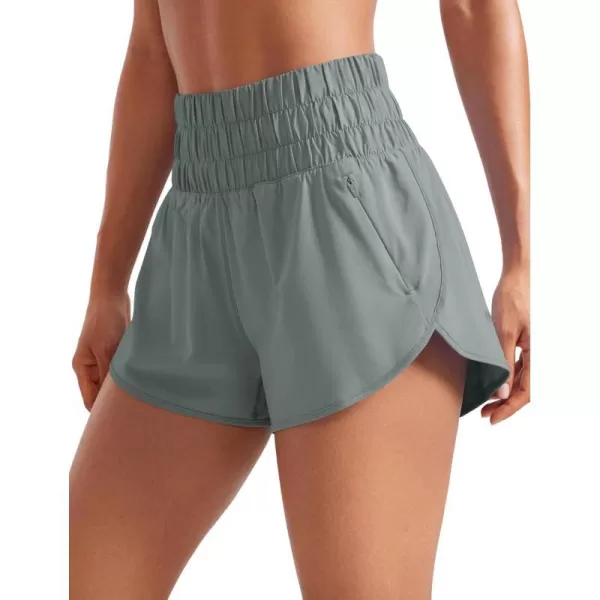 CRZ YOGA High Waisted Dolphin Running Shorts for Womens Mesh Liner Gym Workout Athletic Shorts with Zipper PocketGrey Sage