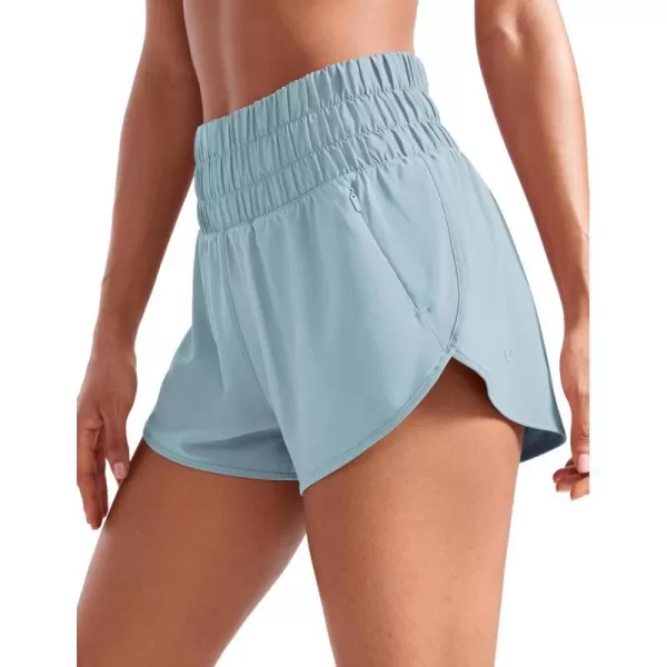 CRZ YOGA High Waisted Dolphin Running Shorts for Womens Mesh Liner Gym Workout Athletic Shorts with Zipper PocketLight Grayish Blue