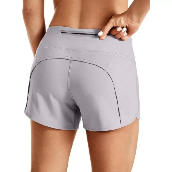 CRZ YOGA High Waisted Running Shorts for Women  254 Liner Gym Athletic Workout Shorts with Pockets Soft LightweightClassic Fit 4  Mid Waisted Dark Chrome