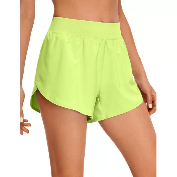 CRZ YOGA Mid Waisted Dolphin Athletic Shorts for Women Lightweight High Split Gym Workout Shorts with Liner Quick DryNeon Yellow