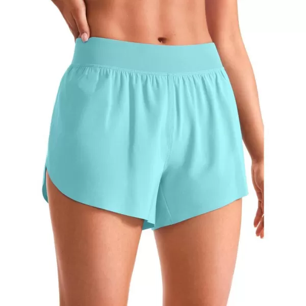 CRZ YOGA Mid Waisted Dolphin Athletic Shorts for Women Lightweight High Split Gym Workout Shorts with Liner Quick DryTurquoise