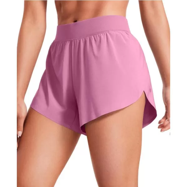 CRZ YOGA Mid Waisted Dolphin Athletic Shorts for Women Lightweight High Split Gym Workout Shorts with Liner Quick DryVelvet Dust