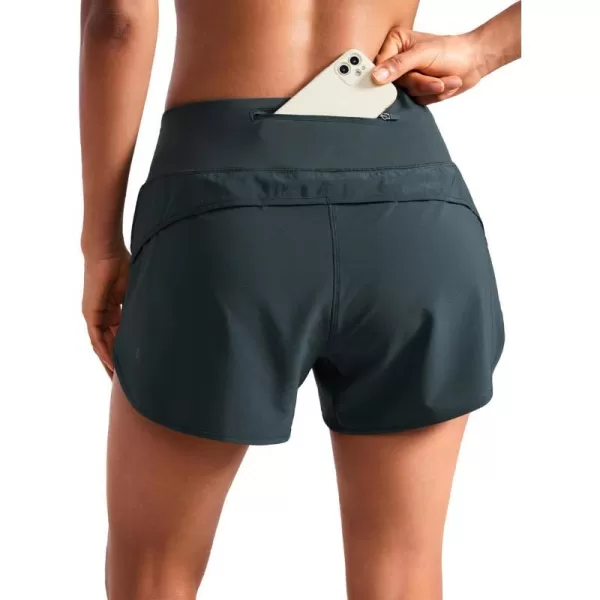 CRZ YOGA Mid Waisted Running Shorts for Women Soft Gym Athletic Workout Shorts with Zipper Pocket Liner Quick DryMelanite