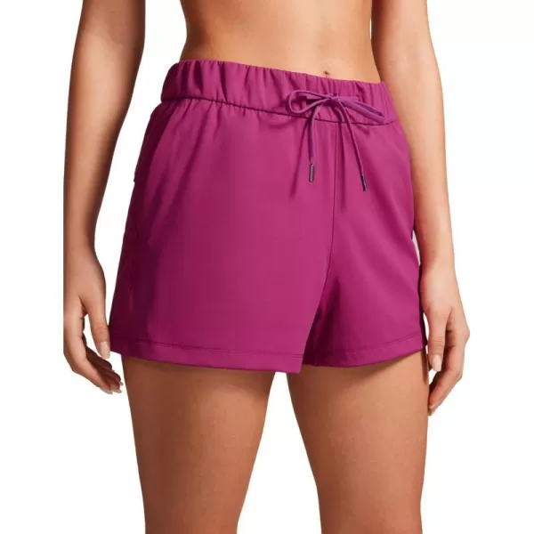 CRZ YOGA Stretch Shorts for Women Work Casual 25  Athletic Shorts with Pockets for Workout Travel Hiking GolfMagenta Purple