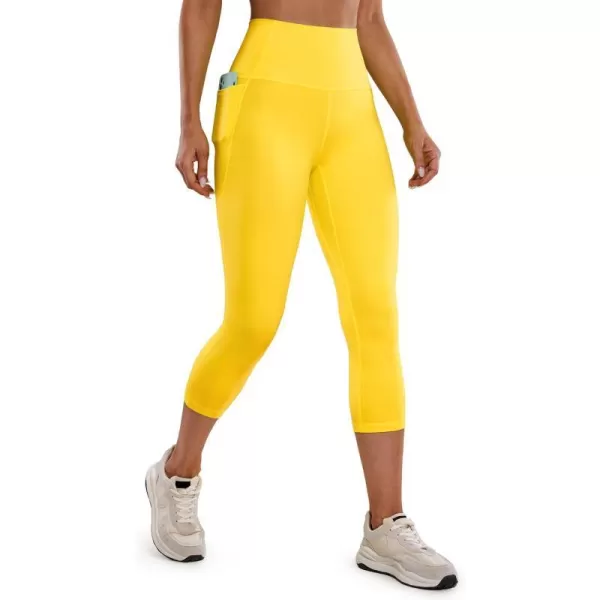 CRZ YOGA Womens Butterluxe Workout Capri Leggings with Pockets 21 Inches  High Waisted Gym Athletic Crop Yoga LeggingsHigh Visibility Yellow