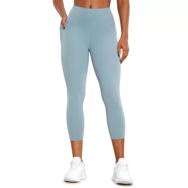 CRZ YOGA Womens Butterluxe Workout Yoga Capri Leggings 23 Inches  High Waist Crop Pants with Pockets Buttery Soft Gym23 inches Light Grayish Blue