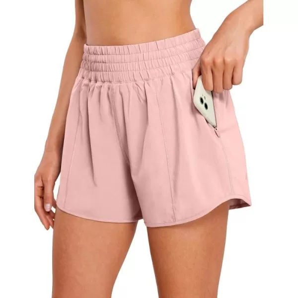 CRZ YOGA Womens High Waisted Running Shorts 4  Mesh Liner Lightweight Gym Sport Athletic Workout Shorts with Zipper PocketPuff Pink