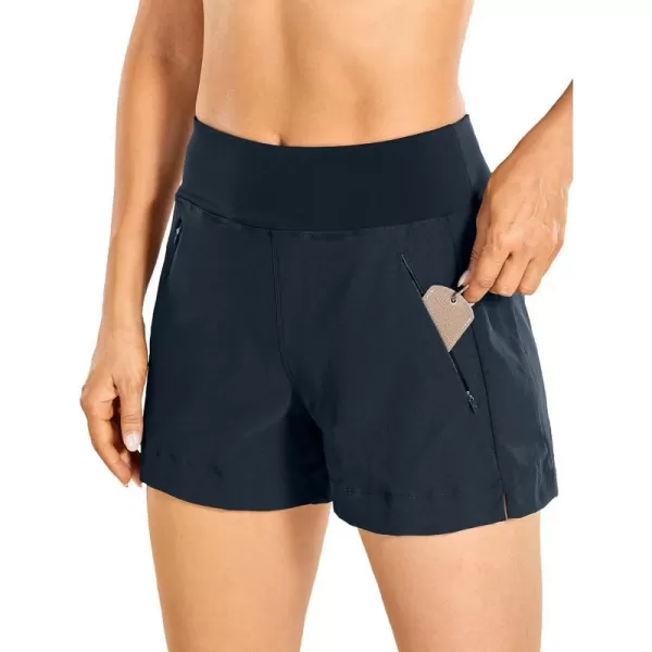 CRZ YOGA Womens Lightweight Mid Rise Hiking Shorts 4  Stretch Athletic Summer Travel Outdoor Golf Shorts Zip PocketsTrue Navy