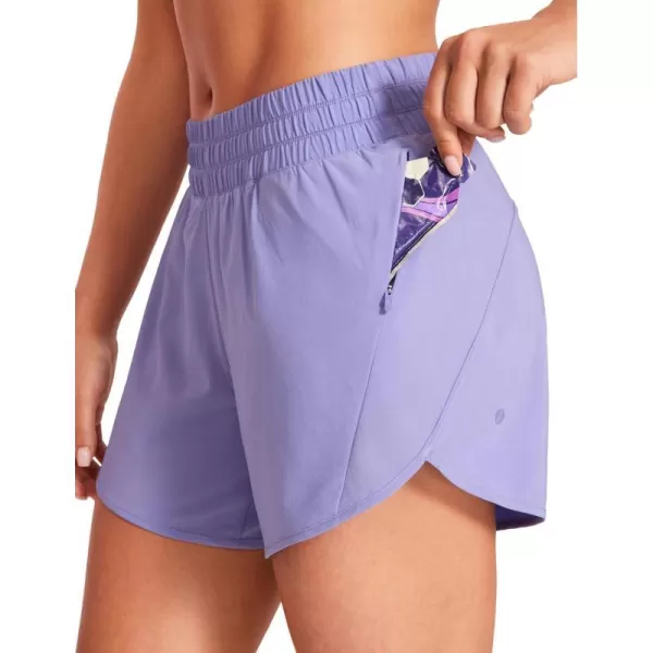 CRZ YOGA Womens Mid Waisted Running Shorts Liner  5 Quick Dry Athletic Sport Workout Track Shorts Zip PocketDark Lavender Purple