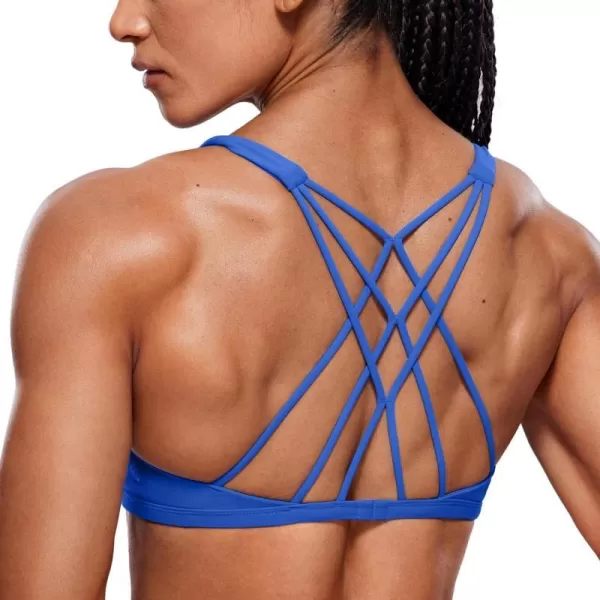 CRZ YOGA Womens Strappy Sports Bra  Criss Cross Back Padded Medium Support Wireless Gym Bra Sexy Workout Yoga BraWaves Blue