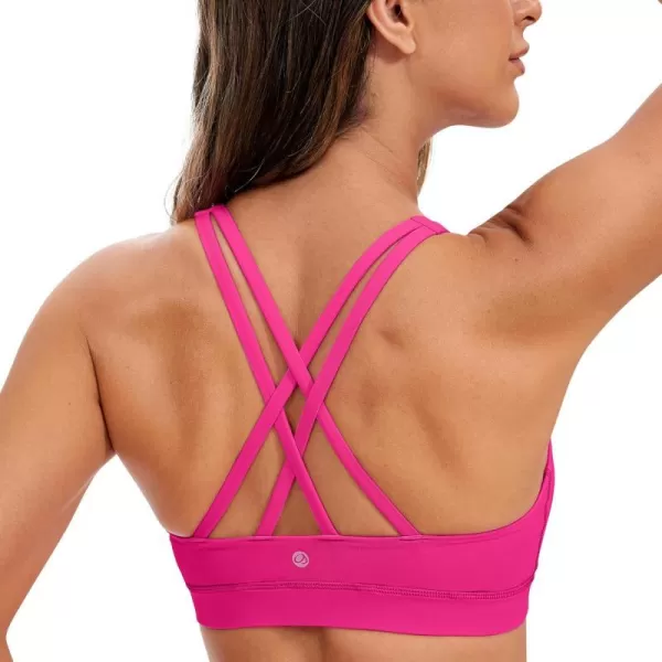 CRZ YOGA Womens Strappy Sports Bras Fitness Workout Padded Yoga Bra Criss Cross BackGranita Pink