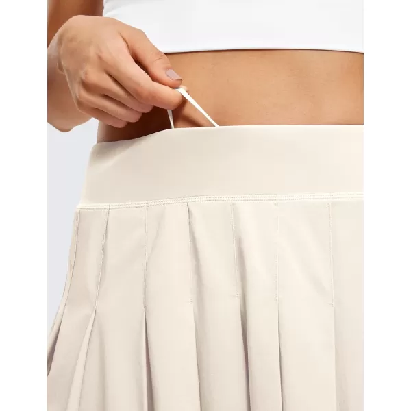 CRZ YOGA Cute Pleated Skirts for Women High Waisted Tennis Golf Skorts with Pockets Casual Athletic Workout SkaterWhite Apricot