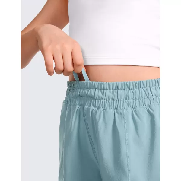 CRZ YOGA Girls Athletic Shorts with Zipper Pocket Lightweight Running Shorts for Teen Girls Kids LinerLight Grayish Blue