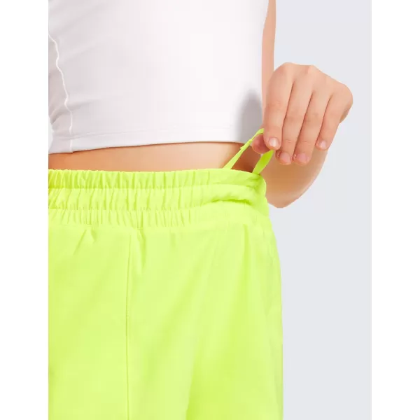 CRZ YOGA Girls Athletic Shorts with Zipper Pocket Lightweight Running Shorts for Teen Girls Kids LinerNeon Yellow