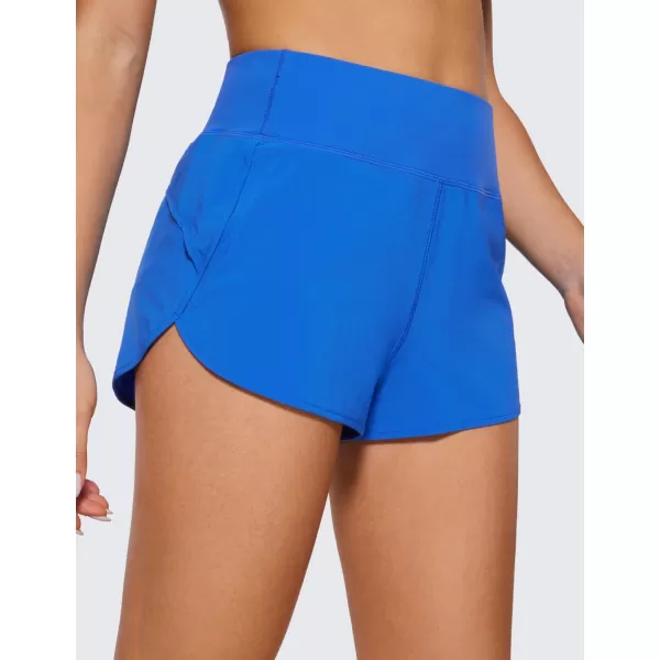 CRZ YOGA High Waisted Running Shorts for Women  254 Liner Gym Athletic Workout Shorts with Pockets Soft Lightweight25  High Waisted Sparkle Blue