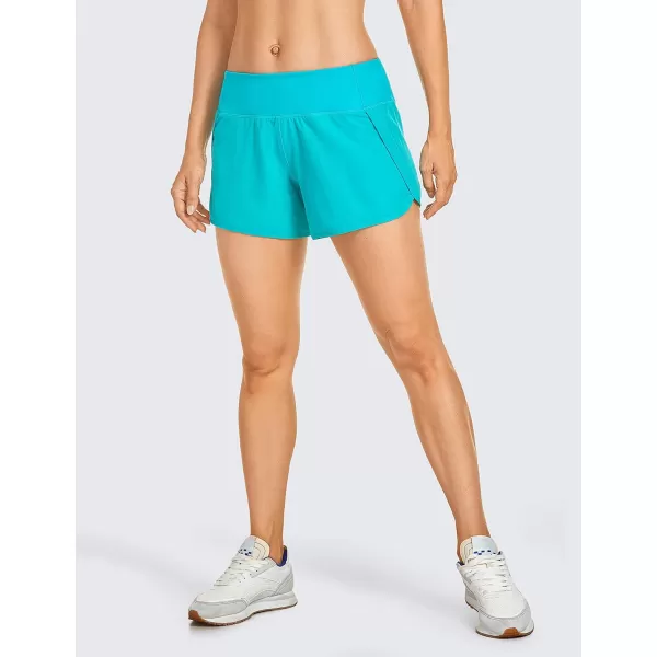 CRZ YOGA High Waisted Running Shorts for Women  254 Liner Gym Athletic Workout Shorts with Pockets Soft Lightweight4  Mid Waisted Holiday Blue