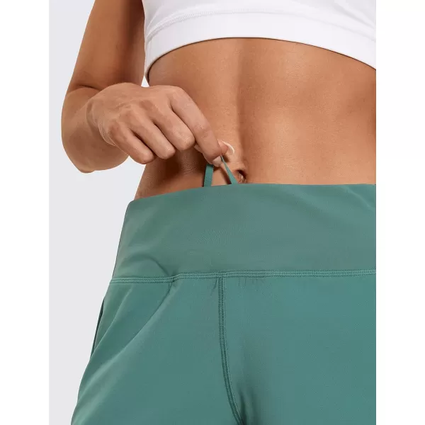 CRZ YOGA High Waisted Running Shorts for Women  254 Liner Gym Athletic Workout Shorts with Pockets Soft Lightweight4  Mid Waisted Smoky Green