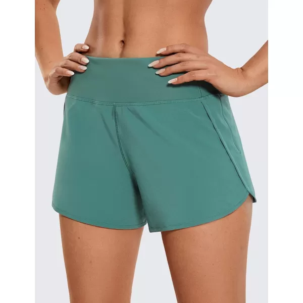 CRZ YOGA High Waisted Running Shorts for Women  254 Liner Gym Athletic Workout Shorts with Pockets Soft Lightweight4  Mid Waisted Smoky Green