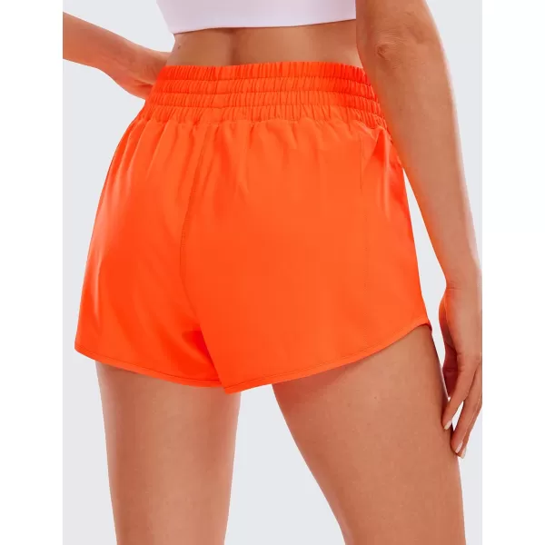 CRZ YOGA High Waisted Running Shorts for Women 25  Mesh Liner Quick Dry Sport Athletic Workout Shorts with Zipper PocketNeon Orange