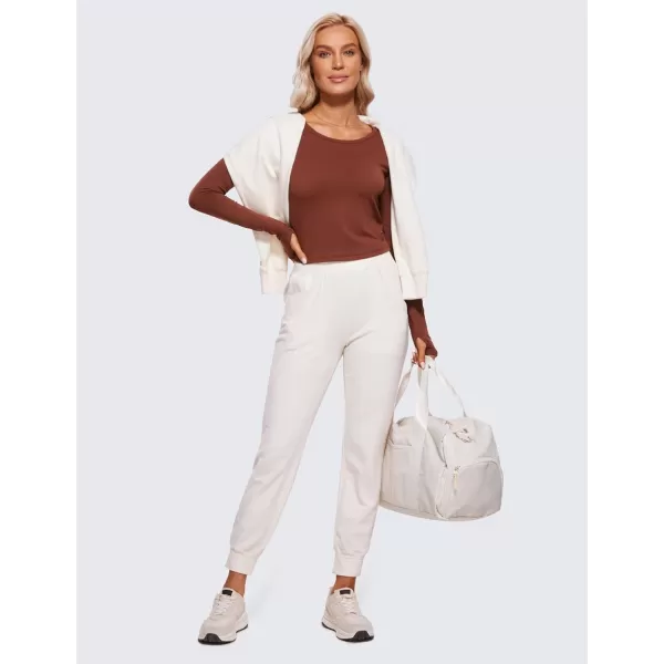 CRZ YOGA Long Sleeve Crop Tops for Women Workout Cropped Top Yoga Slim Fit Athletic Gym Shirts with Thumb HoleJujube Brown