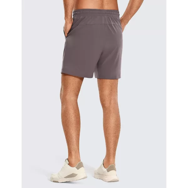 CRZ YOGA Mens 2 in 1 Running Shorts with Liner  5 7 9 Quick Dry Workout Sports Athletic Shorts with Pockets7 inches Purple Taupe