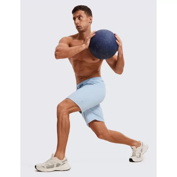 CRZ YOGA Mens FourWay Stretch Workout Shorts  79 Soft Durable Casual Athletic Shorts with Pockets Gym Running Hiking7 inches Chambray Blue