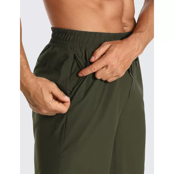 CRZ YOGA Mens Linerless Workout Shorts  7  9 Quick Dry Running Sports Athletic Gym Shorts with Pockets7 inches Dark Olive