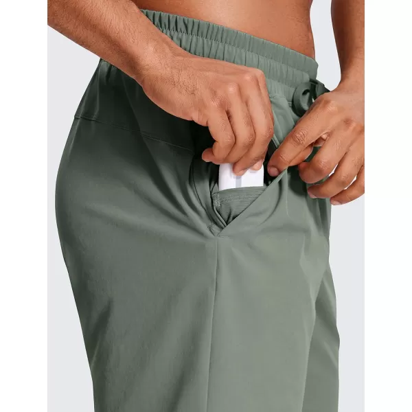 CRZ YOGA Mens Linerless Workout Shorts  7  9 Quick Dry Running Sports Athletic Gym Shorts with Pockets7 inches Grey Sage
