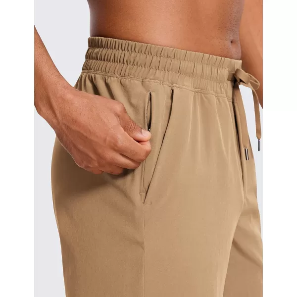 CRZ YOGA Mens Linerless Workout Shorts  7  9 Quick Dry Running Sports Athletic Gym Shorts with Pockets7 inches Khaki Sand