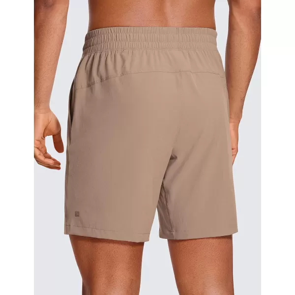 CRZ YOGA Mens Linerless Workout Shorts  7  9 Quick Dry Running Sports Athletic Gym Shorts with Pockets7 inches Mineral Brown