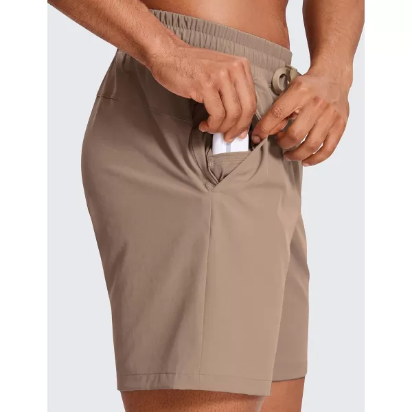 CRZ YOGA Mens Linerless Workout Shorts  7  9 Quick Dry Running Sports Athletic Gym Shorts with Pockets7 inches Mineral Brown