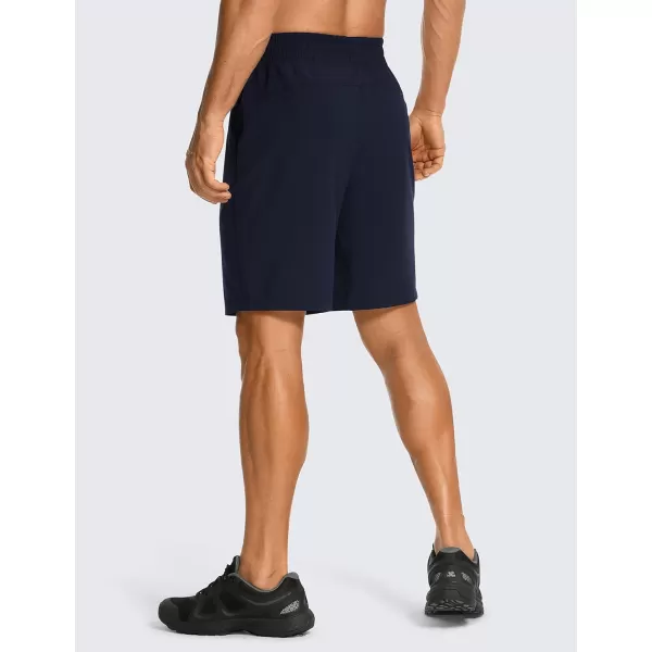 CRZ YOGA Mens Linerless Workout Shorts  7  9 Quick Dry Running Sports Athletic Gym Shorts with Pockets7 inches Navy